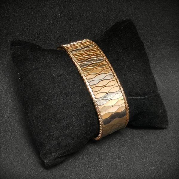 Pulsera Brazalete bicolor.